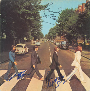 Lot #7054  Beatles: McCartney, Harrison, and Starr Signed Album - Image 1