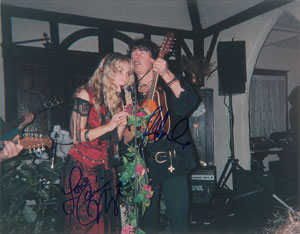 Lot #7152  Deep Purple: Ritchie Blackmore and Candice Night Oversized Signed Photograph - Image 1