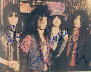 Lot #7442 The Throbs Signed Photograph - Image 1