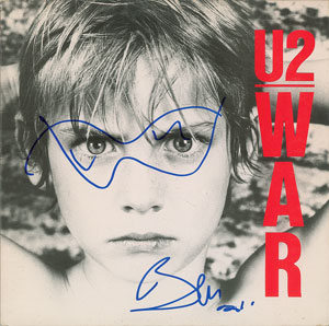 Lot #7346  U2: Bono Signed Album - Image 1