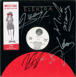 Lot #7317  Motley Crue Signed Album