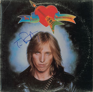 Lot #7195 Tom Petty Signed Album - Image 1