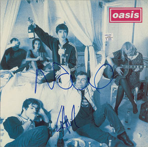 Lot #7415  Oasis Signed Album