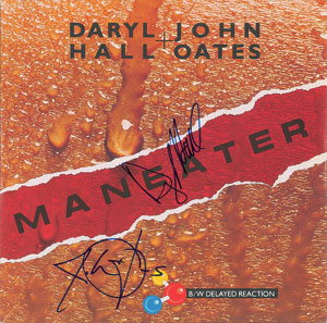 Lot #7169  Hall and Oates Signed Album - Image 1
