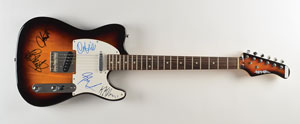 Lot #7301  Judas Priest Signed Guitar