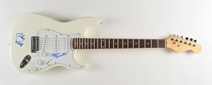 Lot #7241 Johnny and Edgar Winter Signed Guitar - Image 1