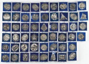 Lot #6285 Collection of (52) Space Shuttle Robbins Medallions  - Image 1