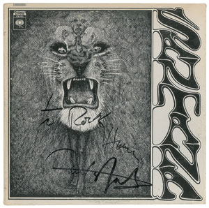 Lot #6188 Carlos Santana Signed Album - Image 1