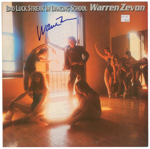 Lot #6317 Warren Zevon Signed Album - Image 1