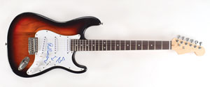Lot #6082  Genesis Signed Guitar - Image 1