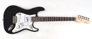 Lot #6135  UFO Signed Guitar - Image 1