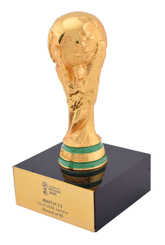 A miniature replica of the World Cup trophy presented by FIFA to