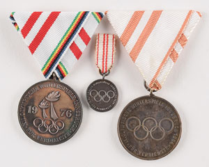 Lot #8065  Innsbruck 1964 and 1976 Winter Olympics Group of (3) Volunteer Medals - Image 1