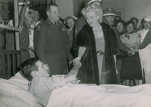 Lot #834 Marilyn Monroe and US Servicemen - Image 1