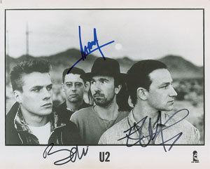 Lot #9379  U2 Signed Photograph