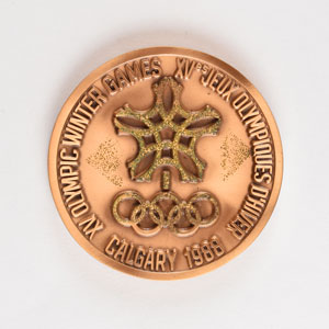 Lot #3106  Calgary 1988 Winter Olympics Bronze Participation Medal - Image 1
