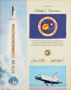 Lot #2670  STS-26 Flown Flag - Image 1