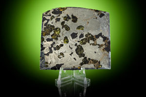 Lot #2138  Seymchan Pallasite Meteorite Partial Slice - Image 1