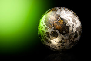 Lot #2139  Seymchan Pallasite Meteorite Polished Sphere - Image 1