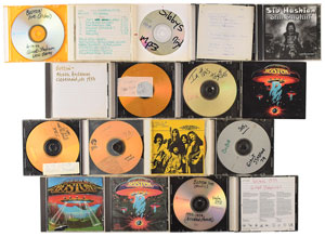 Lot #5276  Boston: Sib Hashian's Collection of (18) CDs and DVDs