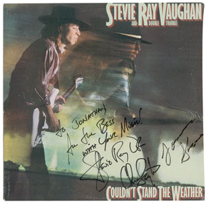 Lot #9278 Stevie Ray Vaughan and Double Trouble Signed Album - Image 1