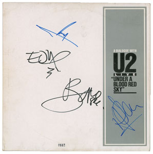 Lot #9410  U2 Signed Album - Image 1