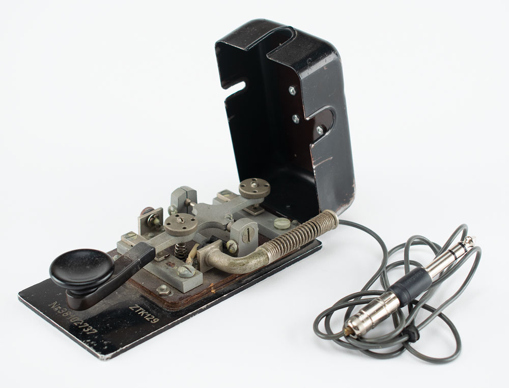 Lot #3018  USCGC Eastwind: Captured German Telegraph Key and VJ Day Dispatch