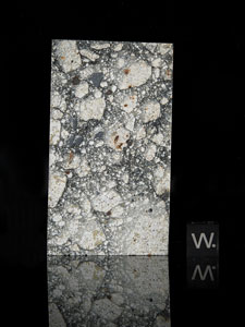 Lot #4569  Northwest Africa (NWA) 5000 Lunar Meteorite Part Slice “The Monolith” - Image 2