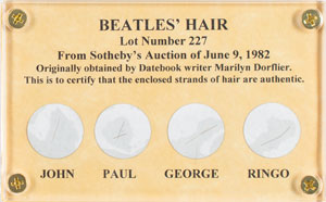 Lot #5204  Beatles Hair Display - Image 1
