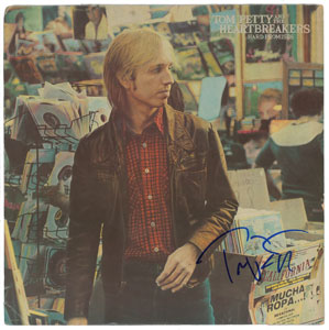 Lot #5467 Tom Petty Signed Album - Image 1