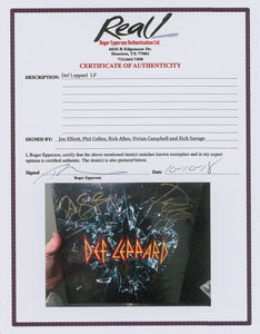 Lot #5498  Def Leppard Signed Album - Image 2