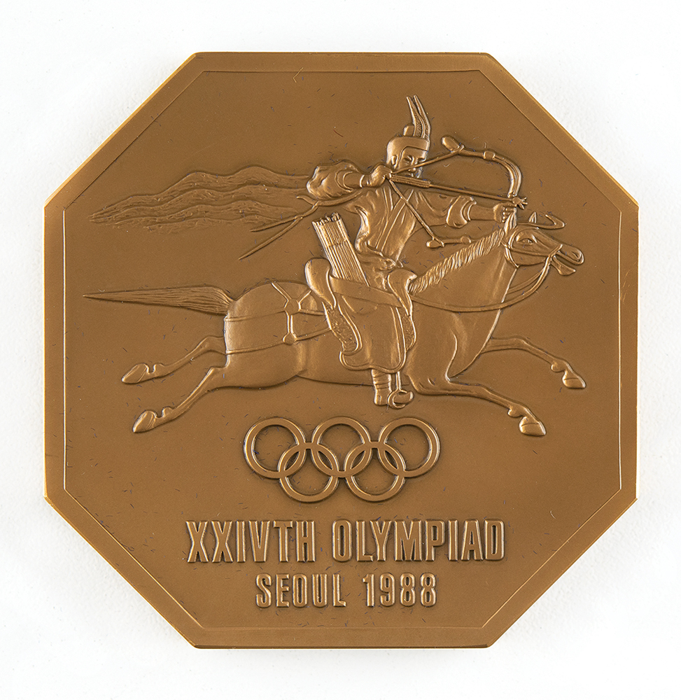Lot #7133  Seoul 1988 Summer Olympics Press Participation Medal
