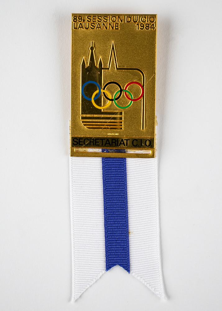 Lot #7124  Lausanne 1984 IOC Session Badge
