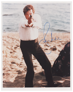 Lot #528 Roger Moore - Image 1
