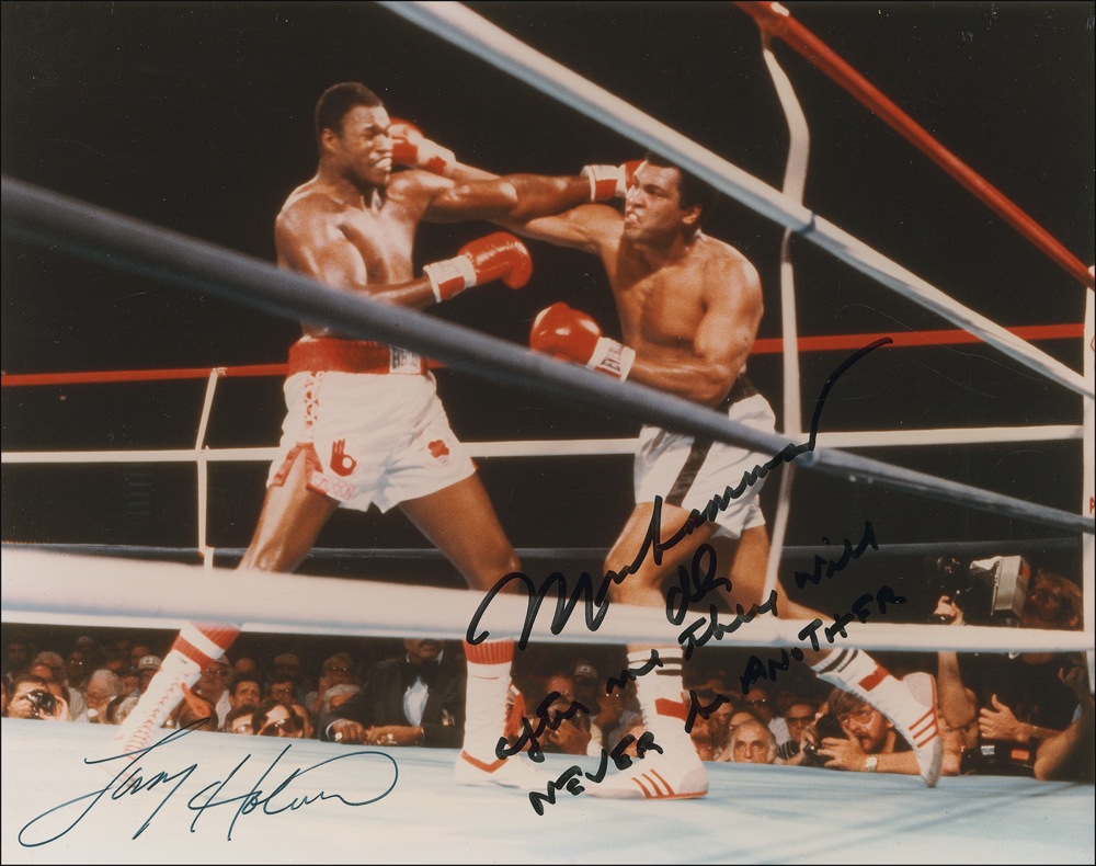 Lot #1416 Muhammad Ali and Larry Holmes