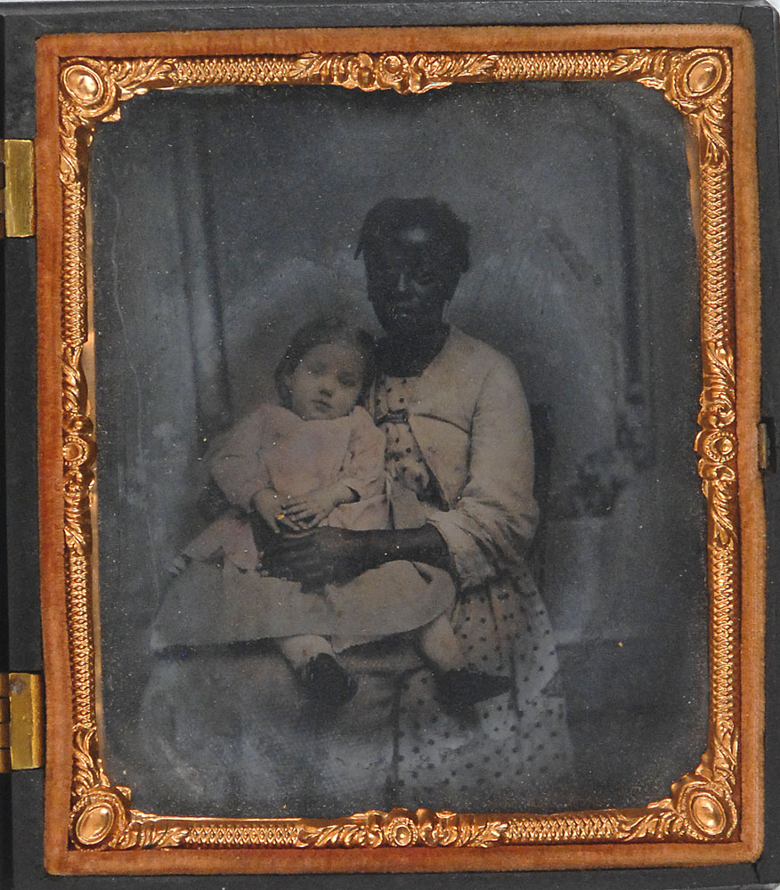 Lot #506  African-American Woman Holding Child