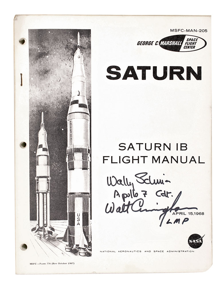 Lot #113 Schirra and Cunningham Signed Saturn IB Manual