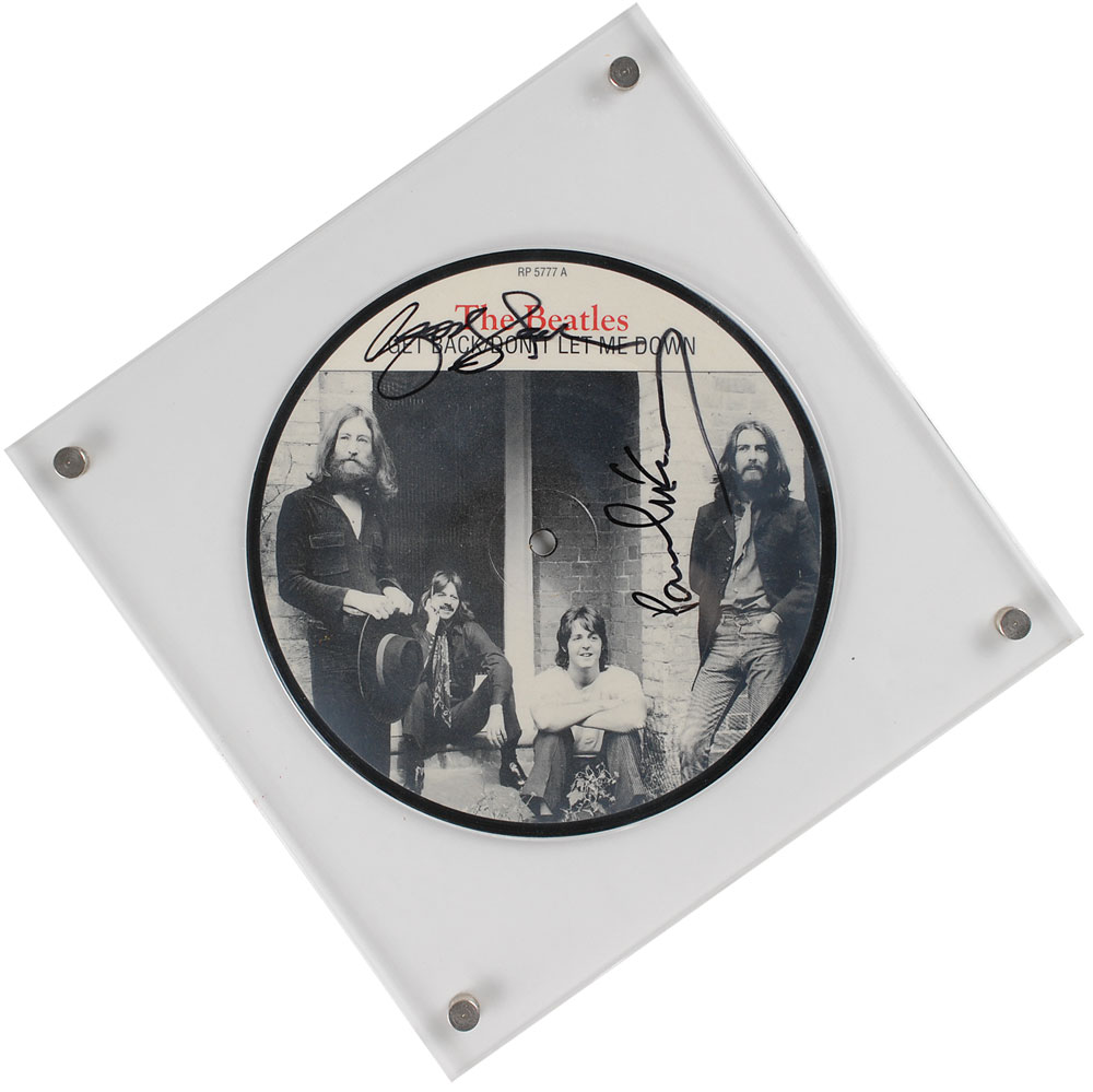 Lot #7014 Paul McCartney and George Harrison Signed Picture Disc