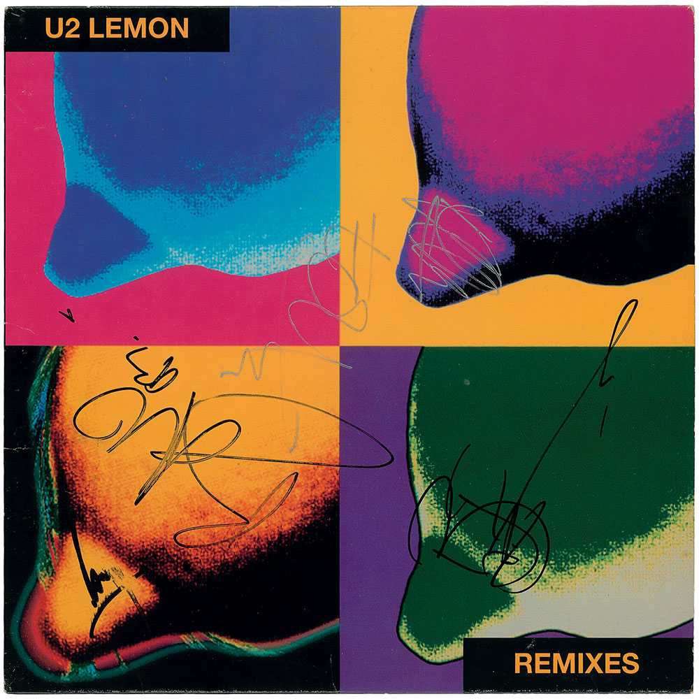 Lot #7513 U2 Signed Album