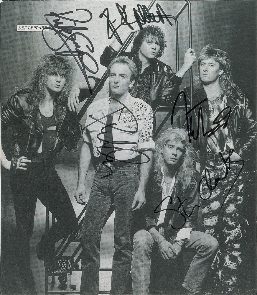Lot #7363 Def Leppard Signed Magazine Photograph