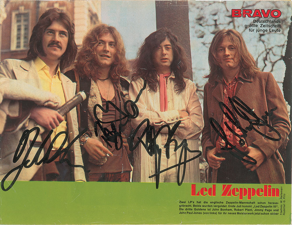 Lot #7181 Led Zeppelin Signed Magazine Photograph