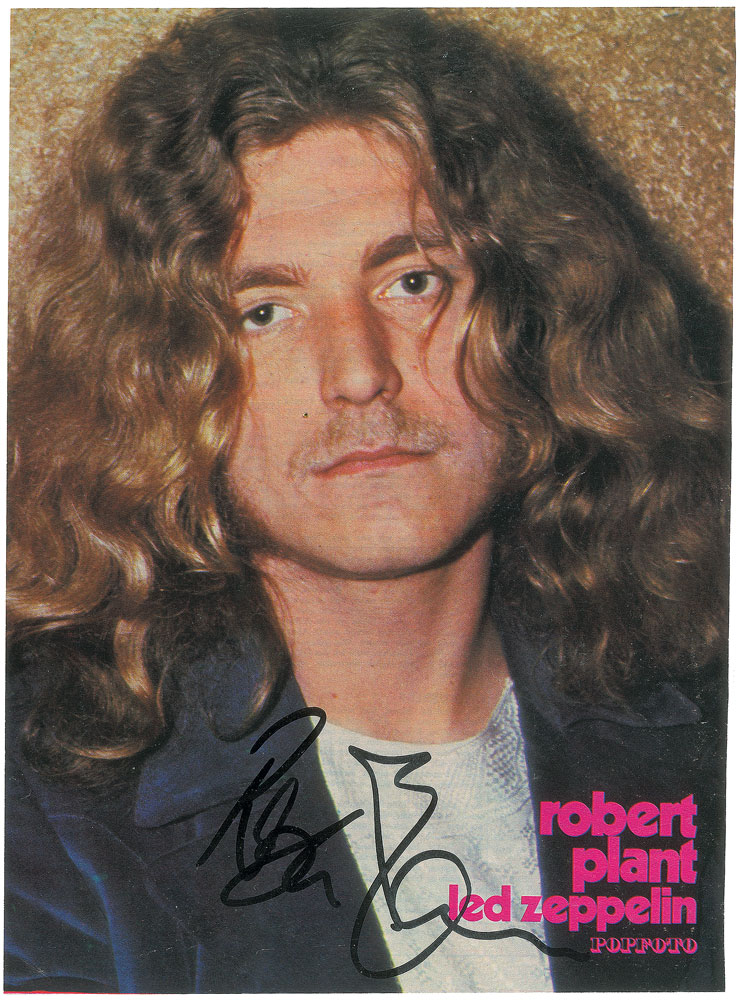 Lot #7186 Robert Plant Signed Magazine Photograph